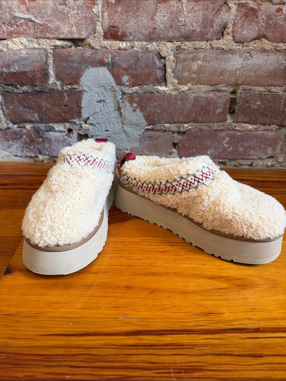 UGG Cream Sherpa Platform Mules with Red Stitching